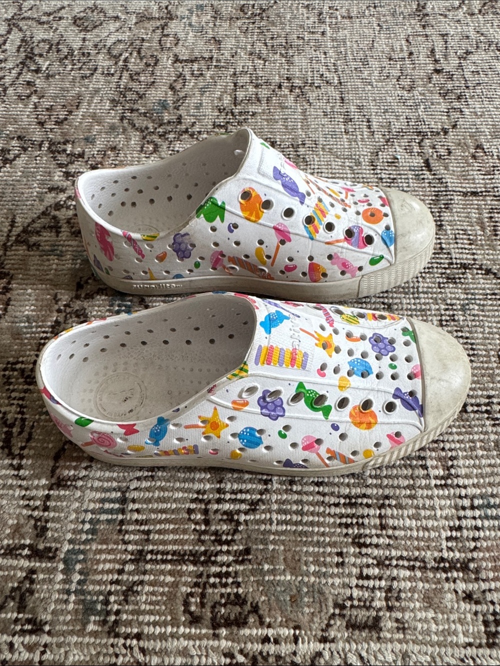 Native Kids White Slip-On Sneakers with Colorful Candy Print, Size 12
